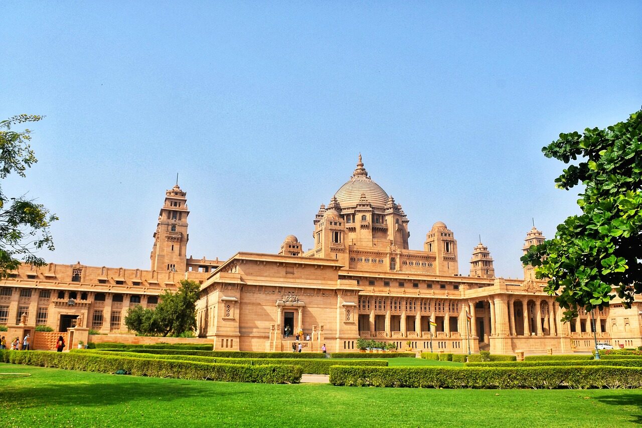 silhouette of people on boat on water during sunset